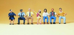 Personnel et passagers assis dans Tramway