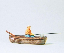 Pêcheur en bateau